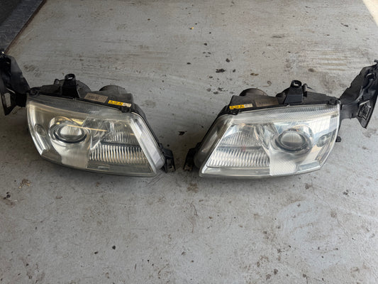Saab 9-5 xenon koplampen in nette staat